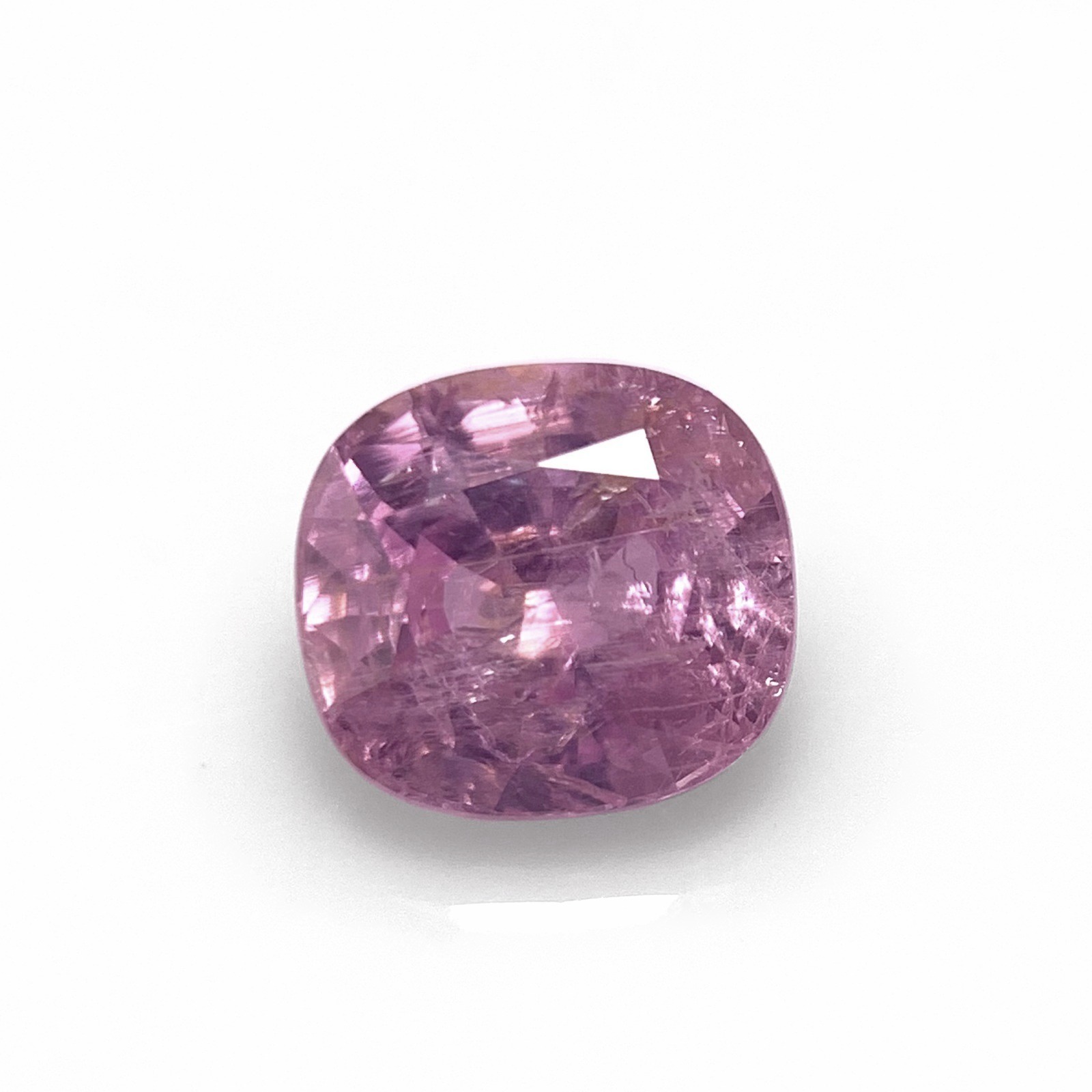 Natural unheated pink milky sapphire 3.50 ct cushion from Luc Yen Vietnam, face-up on white background