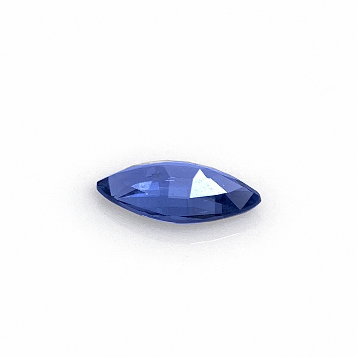 Natural blue spinel, pavilion view on white background