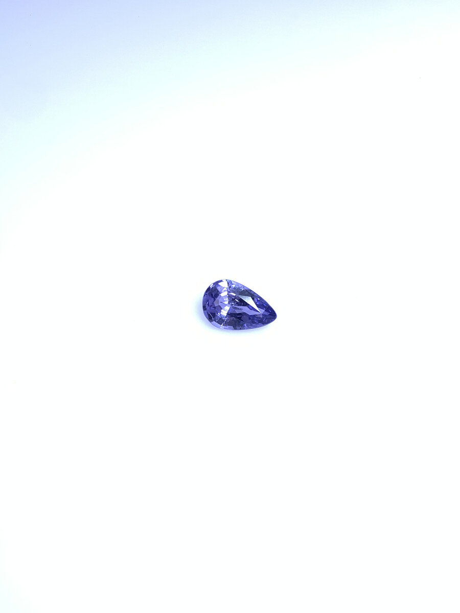 Natural blue spinel from Luc Yen held in daylight