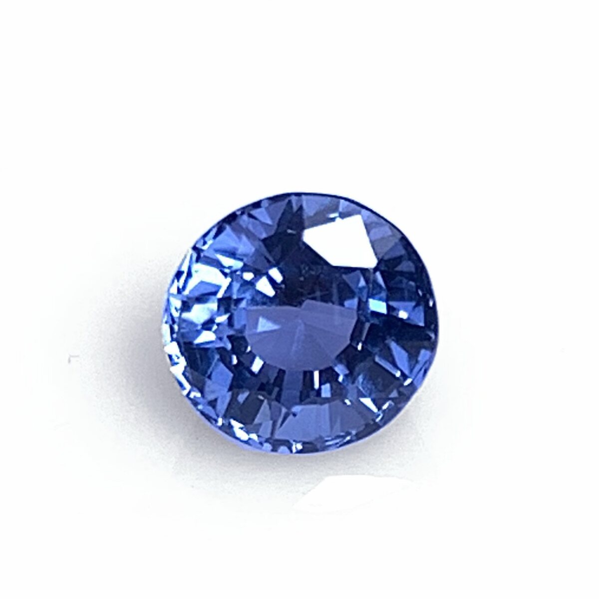 Natural blue spinel 0.83 ct from Luc Yen Vietnam, face up on white background