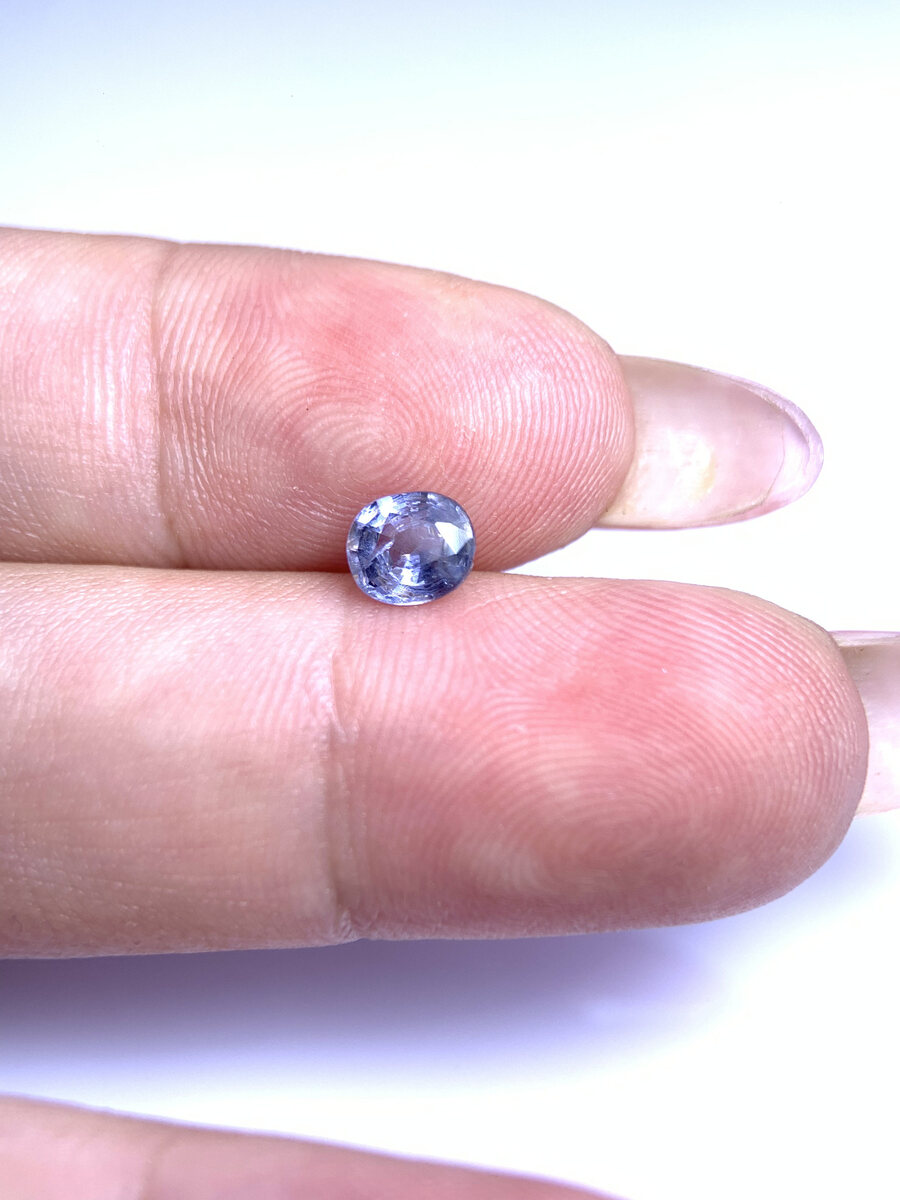 Natural pale blue spinel from Luc Yen held in daylight