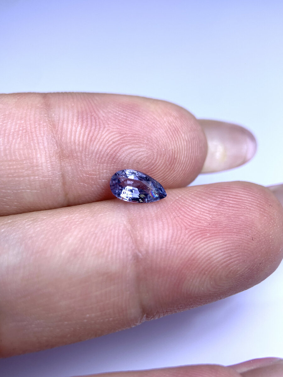 Natural pale blue spinel from Luc Yen held in daylight