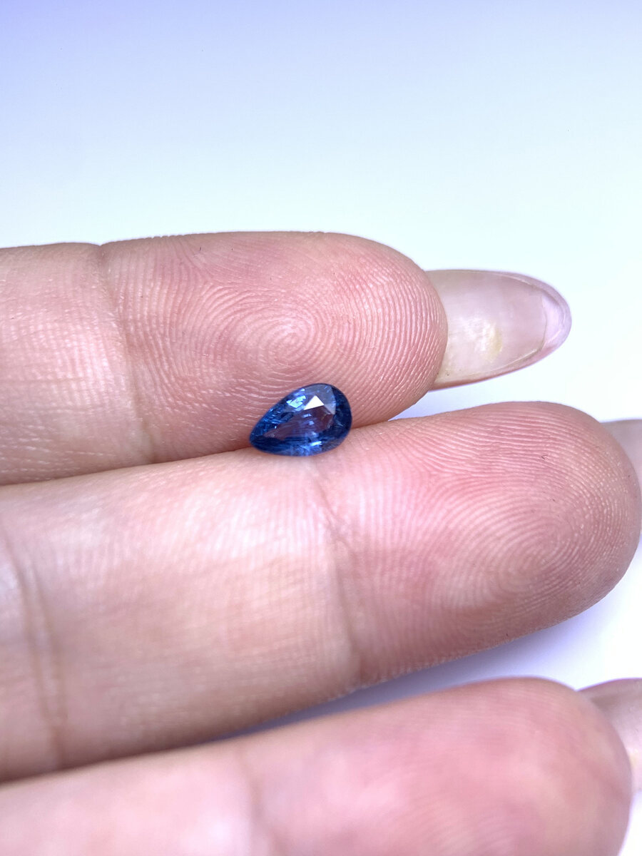 Natural blue spinel from Luc Yen held in daylight